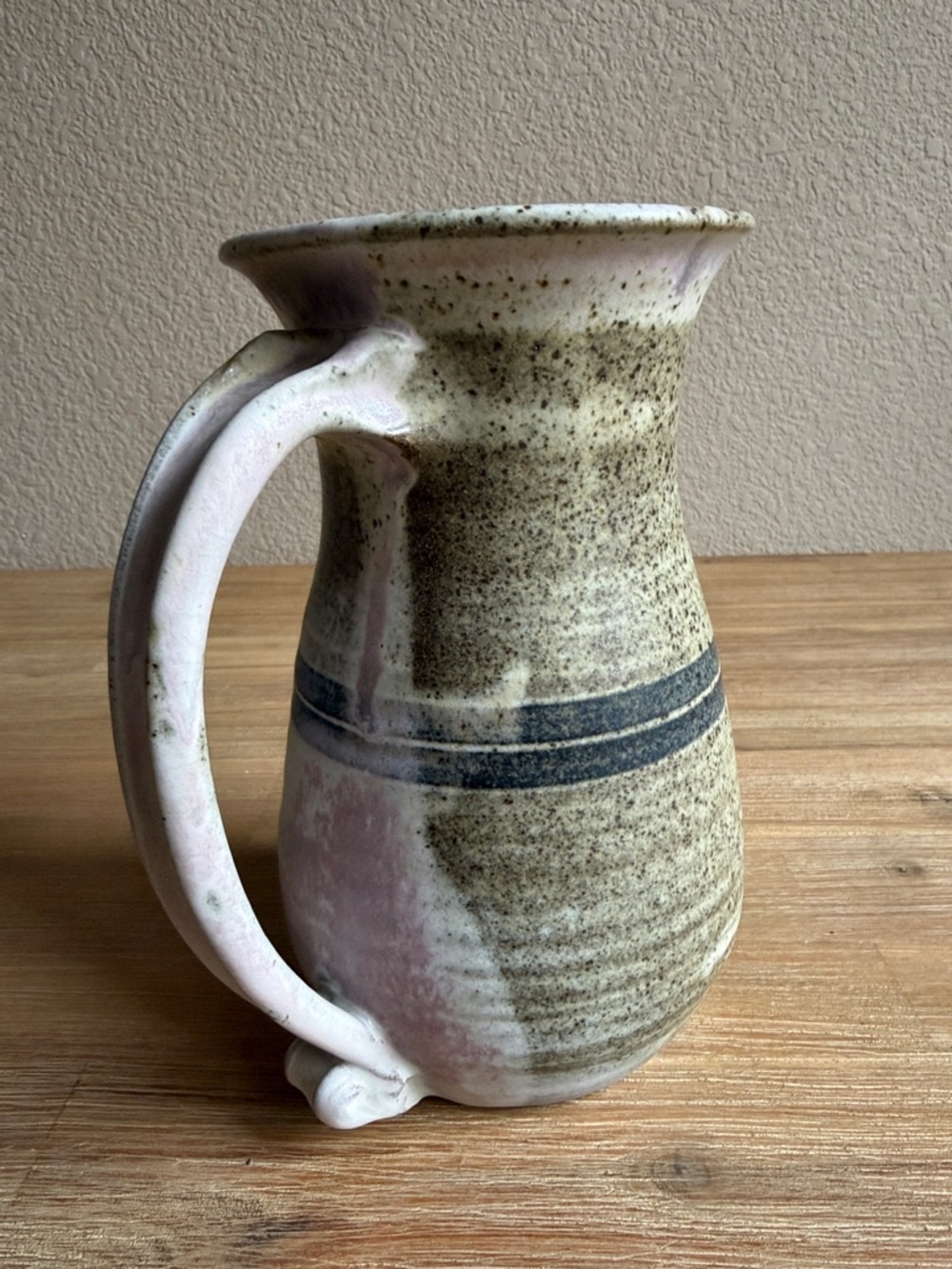 Handcrafted Speckled Ceramic Pitcher in Beige with Blue Stripe - Picture 8 of 13